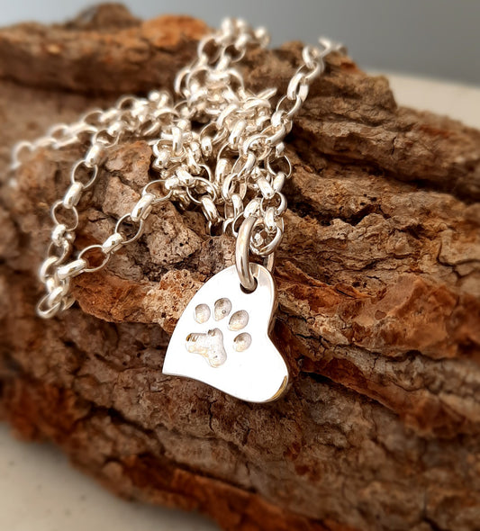 Heart shaped pendant with paw print